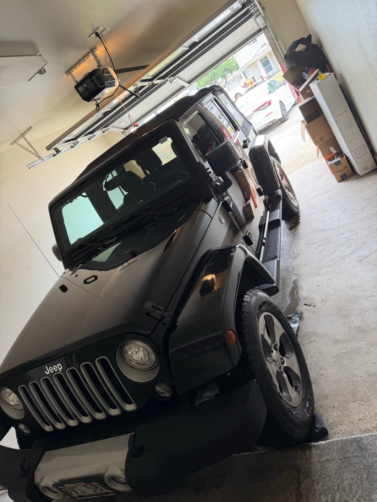 Black Jeep Wrangler interior detail in garage — Haleiwa, North Shore, Oahu Hawaii
